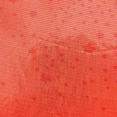 Printed fishnet fabric - red stars