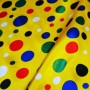 Carnival satin fabric - big multicolored dots on yellow background