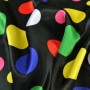 Tejido raso carnaval - lunares multicolores fondo negro