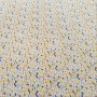 Cotton bachette fabric printed with yellow water drops, flat pattern