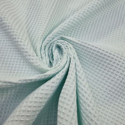 Mint embossed cotton piqué fabric