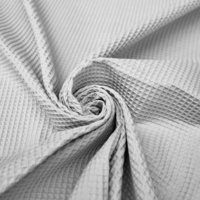 Embossed cotton piqué fabric - white