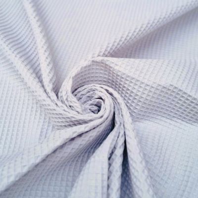 White embossed cotton piqué fabric