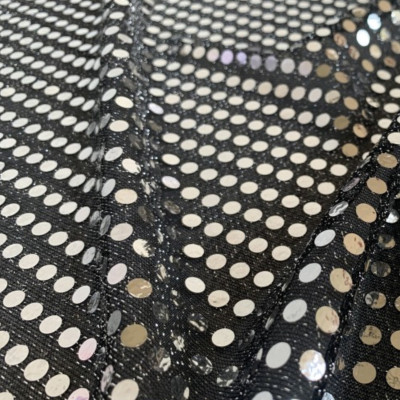 Round sequin fabric - silver on black background